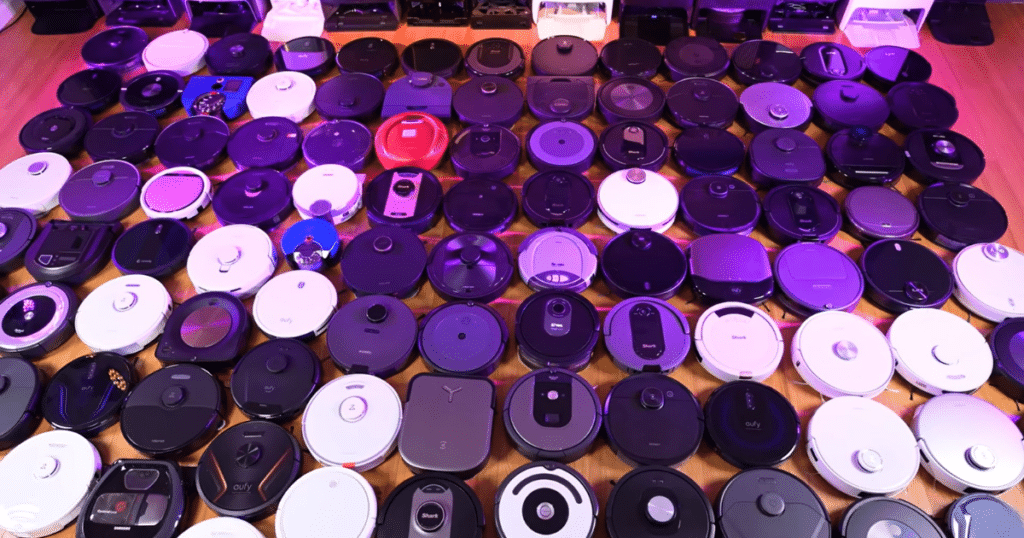 fcc why ban robot vacuums in studio | Vacuum Wars Dozens of robot vacuums from multiple brands displayed together, illustrating the wide range of connected autonomous cleaning robots affected by the FCC's definition of advanced robotic devices.