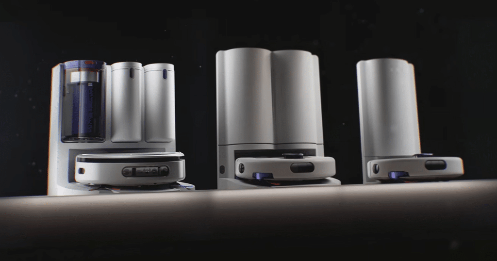 Dyson Nurovi Robot Vacuum Lineup | Vacuum Wars Three Dyson Nurovi robot vacuum models positioned with their docking stations against a dark background.