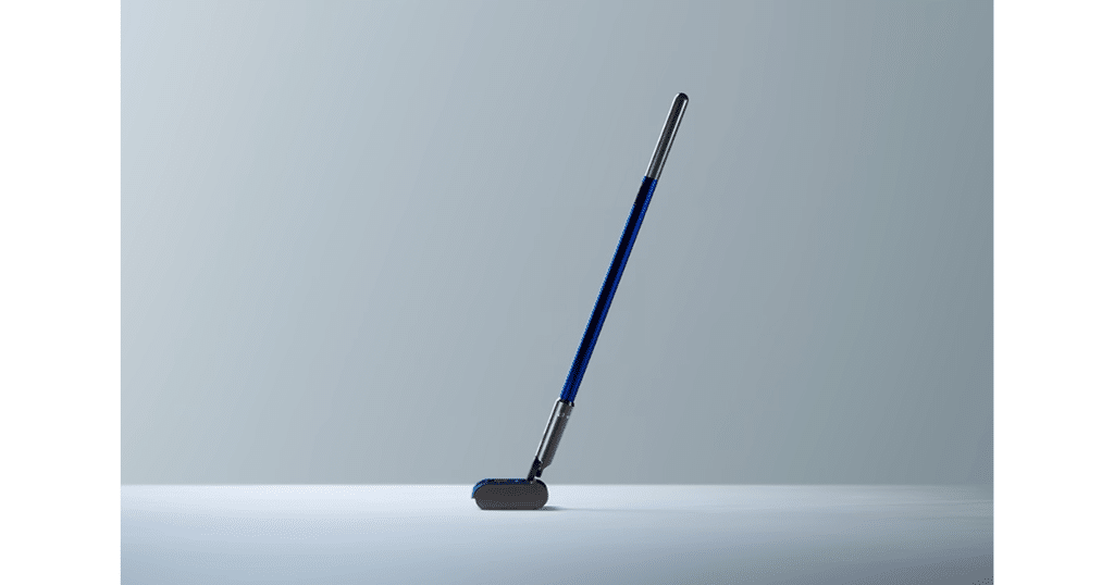 Dyson PencilWash W1 Wet Dry Vacuum | Vacuum Wars Dyson W1 PencilWash wet floor cleaner shown in profile against a light blue background.