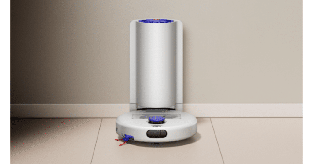 Dyson R1 Nurovi Dry Robot Vacuum | Vacuum Wars White Dyson R1 Nurovi Dry robot vacuum positioned in front of its tall cylindrical docking station.