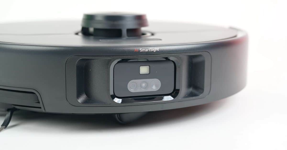 | Vacuum Wars Close-up of the MOVA P70 Pro Ultra AI SmartSight obstacle-avoidance system with camera, LED light assistance, and 3D structured-light sensors.