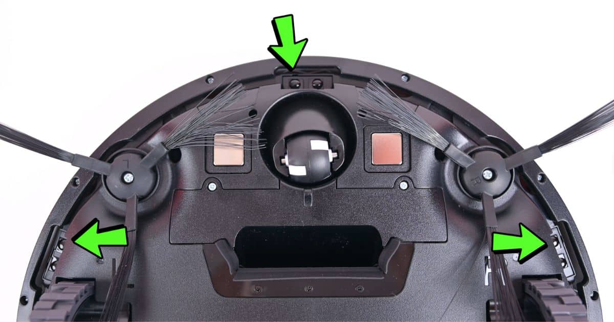 iLife-V2-Robot-Vacuum-Review-sensors | Vacuum Wars Underside of a robotic vacuum with side brushes extended; green arrows point to sensors and front area on the base.