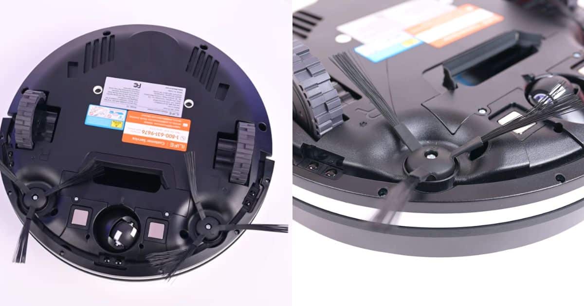 | Vacuum Wars Underside of the iLife V2 robot vacuum showing two fixed side brushes and an open suction port with no rotating main brush roll.