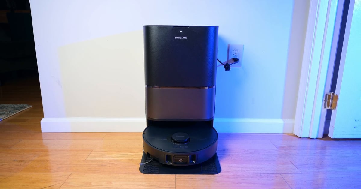 Dreame L40 Ultra Gen 2 — Black dock in use | Vacuum Wars Dreame L40 Ultra Gen 2 robot docked in its black base station on a wood floor.