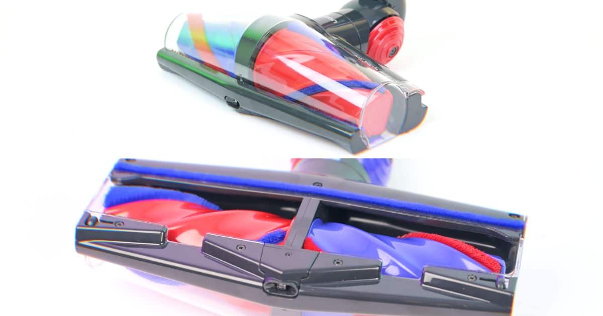 | Vacuum Wars Two close-up views of the Dyson V10 Konical All Floor Cones cleaner head, showing its dual red and purple conical brush rollers from the front and underside.