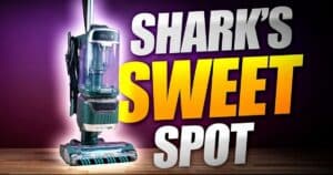 | Vacuum Wars Shark Detect Pro LA802 upright vacuum displayed with large “SHARK’S SWEET SPOT” text in the background.