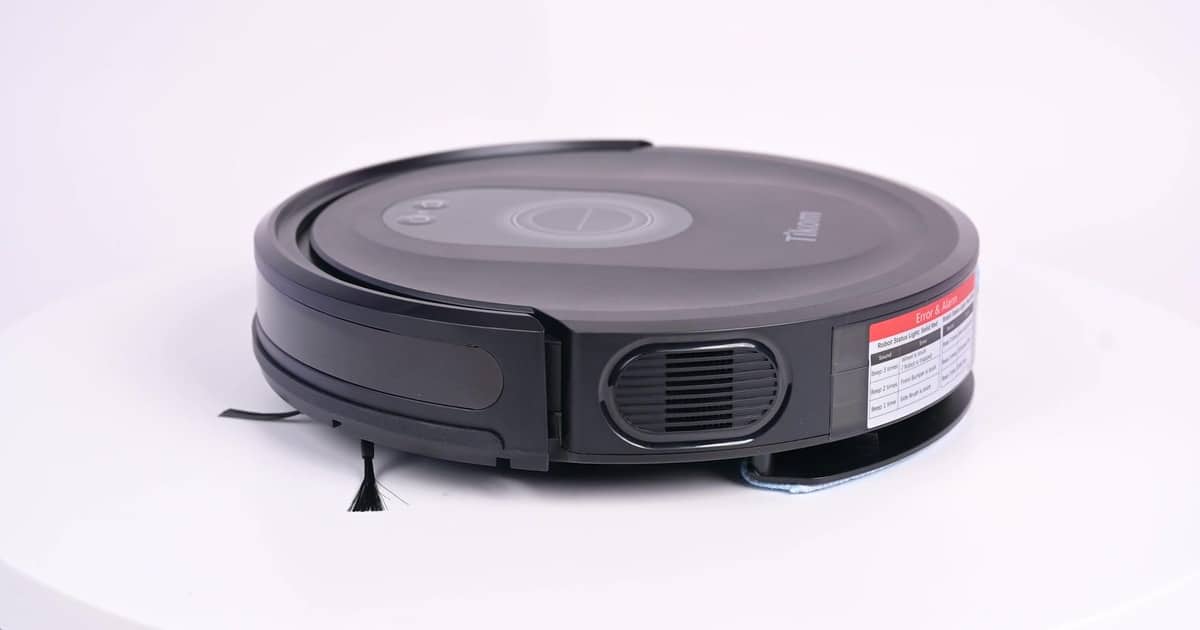Tikom G8000 Max hero | Vacuum Wars Tikom G8000 Max robot vacuum at the Vacuum Wars studio.