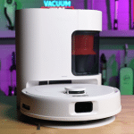 Yeedi C14 Pro Plus robot vacuum and bagless auto-empty dock at the Vacuum Wars studio.