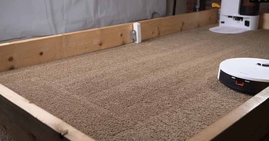 Yeedi C14 PRO Plus roboto vacuum carpet deep clean test 2 | Vacuum Wars Yeedi C14 Pro Plus robot vacuum successfully vacuuming fine debris on a carpet in the Vacuum Wars studio.